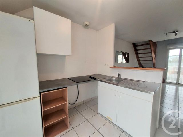 Appartement Duplex à louer - 2 pièces - 31.84 m2 - LUCE - 28 - CENTRE - Century 21 Maitrejean Immobilier